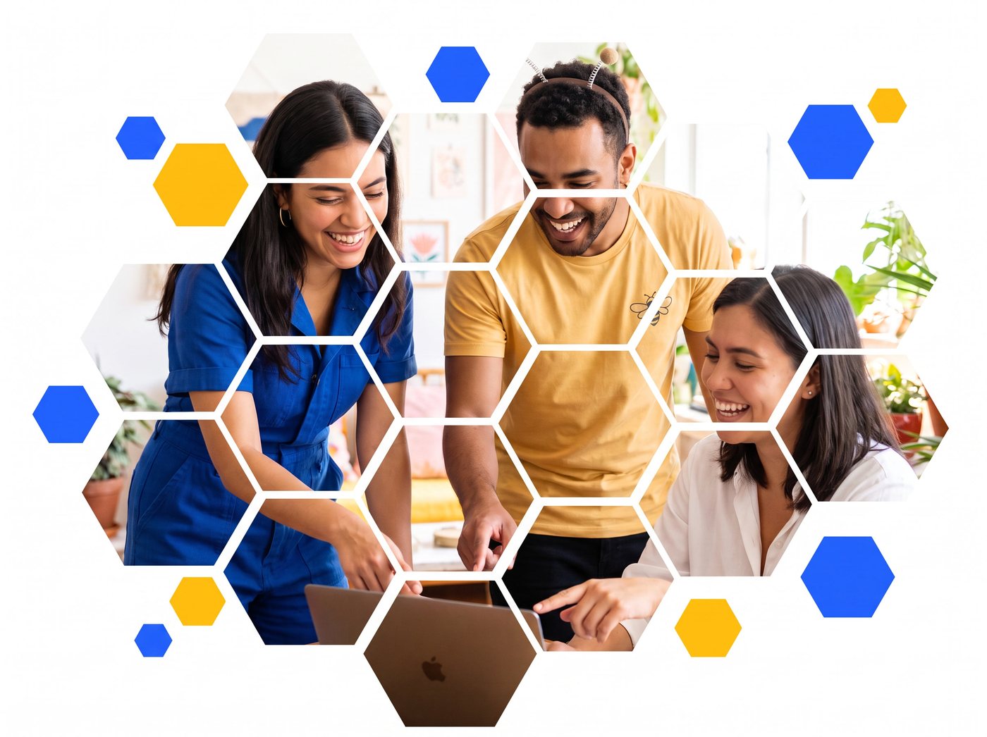 Team reviewing a website build on a laptop
